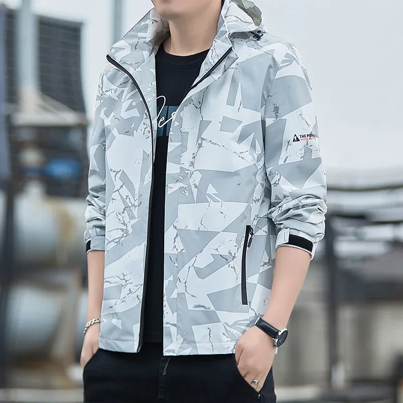 เสื้อแจ็คเก็ตเดินป่าฤดูใบไม้ร่ - Windproof Jacket Softshell บทวิจารณ์และราคา